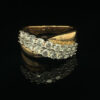 Yellow gold band with diagonal diamond row.