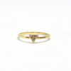 Gold triangle ring with diamond accent stones.