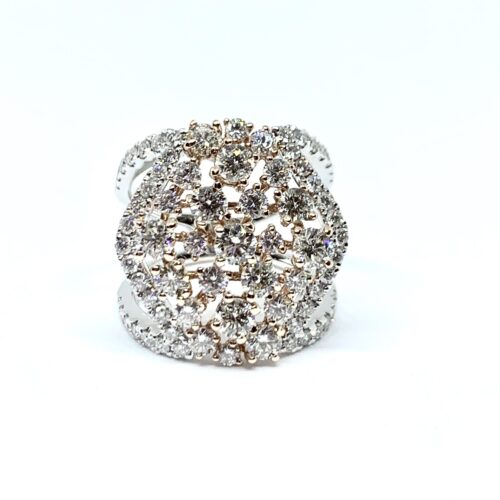 Two-tone diamond ring with contrasting gems