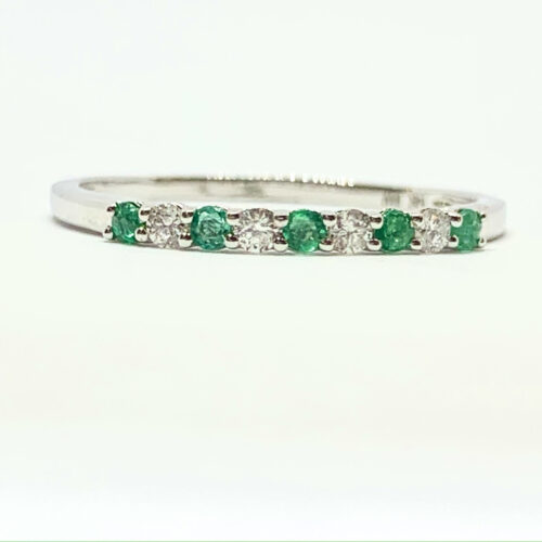 ring with green diamonds
