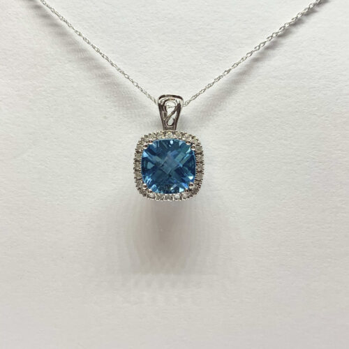 Blue topaz and diamond pendant necklace