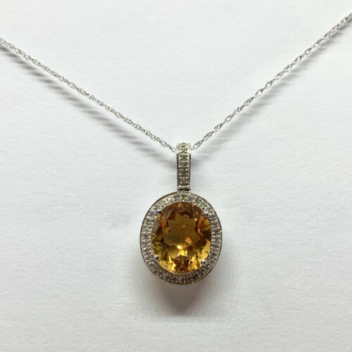 Citrine and diamond pendant necklace in white gold