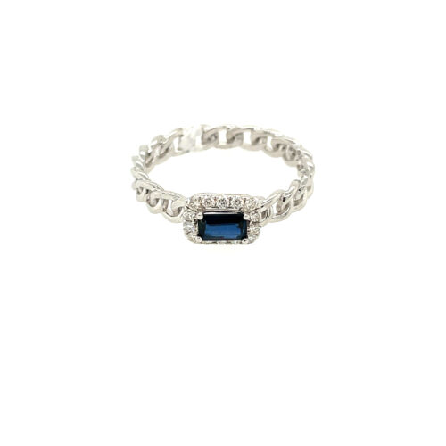 Sapphire shines amidst sparkling diamonds in white gold ring