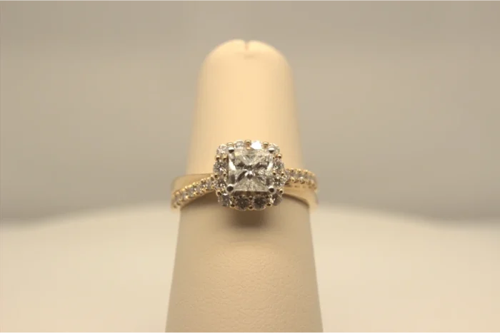 A photo of a radiant cut diamond engagement ring